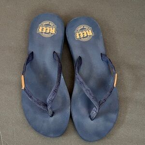 Reef Dark Blue Flip Flops with Tan Accents Size 10